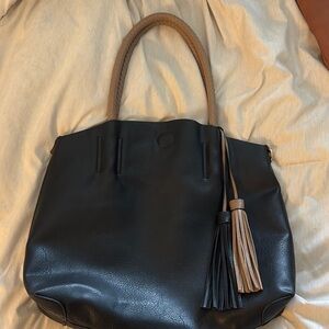 Chic Black and Tan Leather Tote with Tassel Accent
